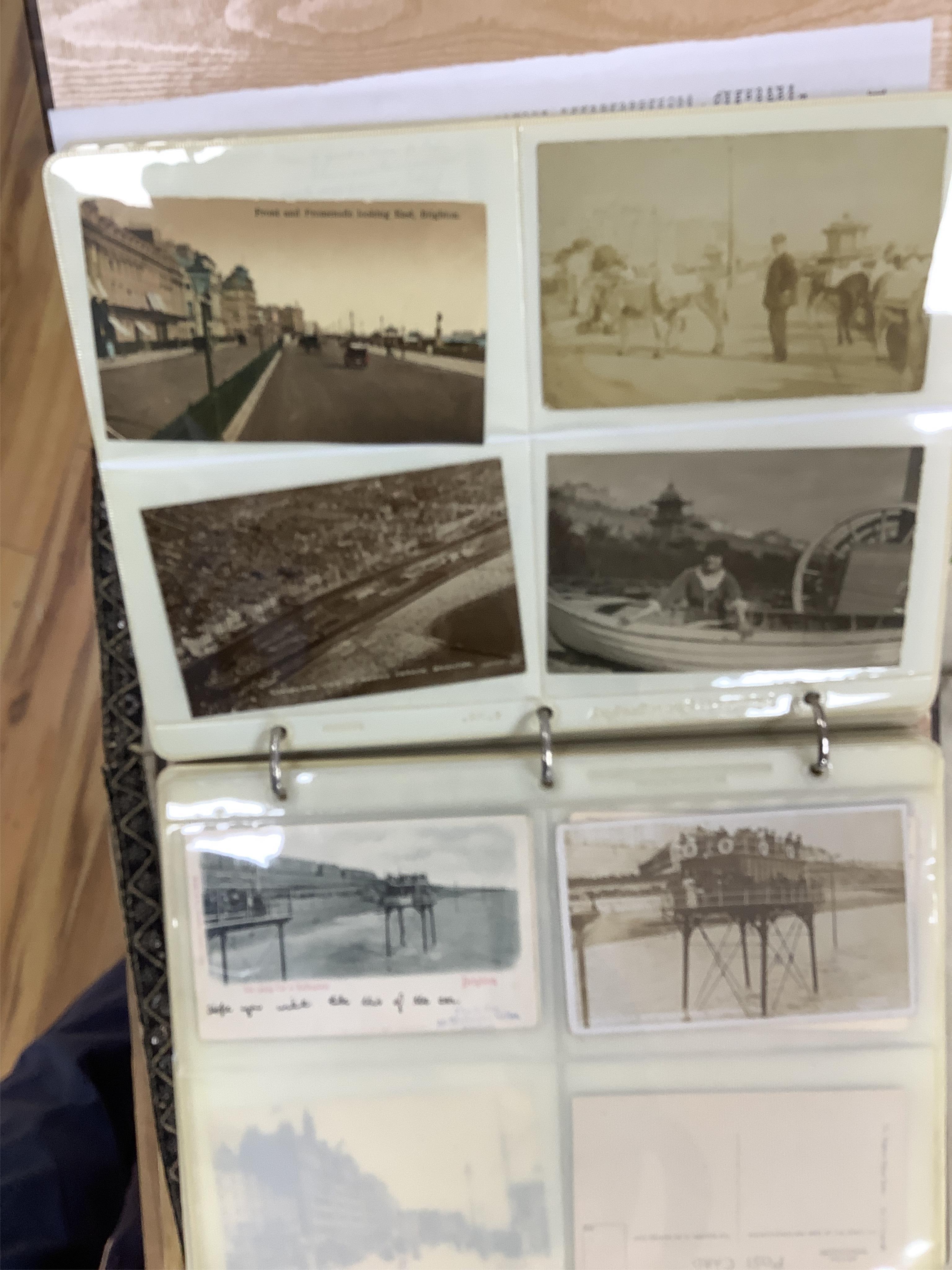 Three assorted postcard albums; a good selection of Brighton, Hove and Environs. Condition - as viewed